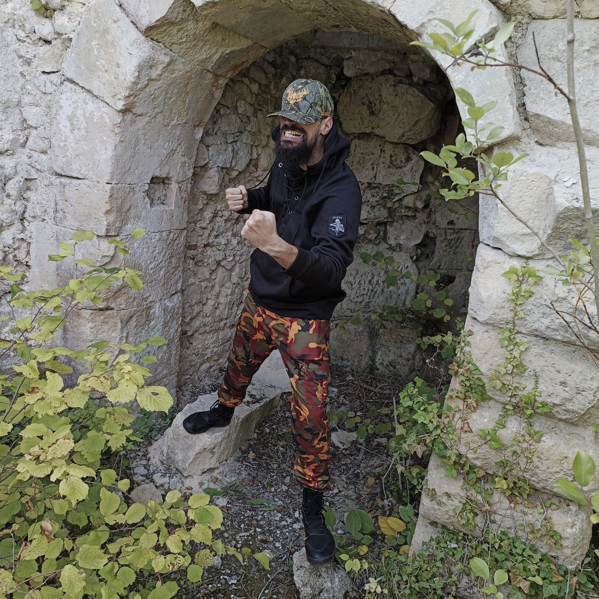 The Hazardous Environment Pants [orange camo]