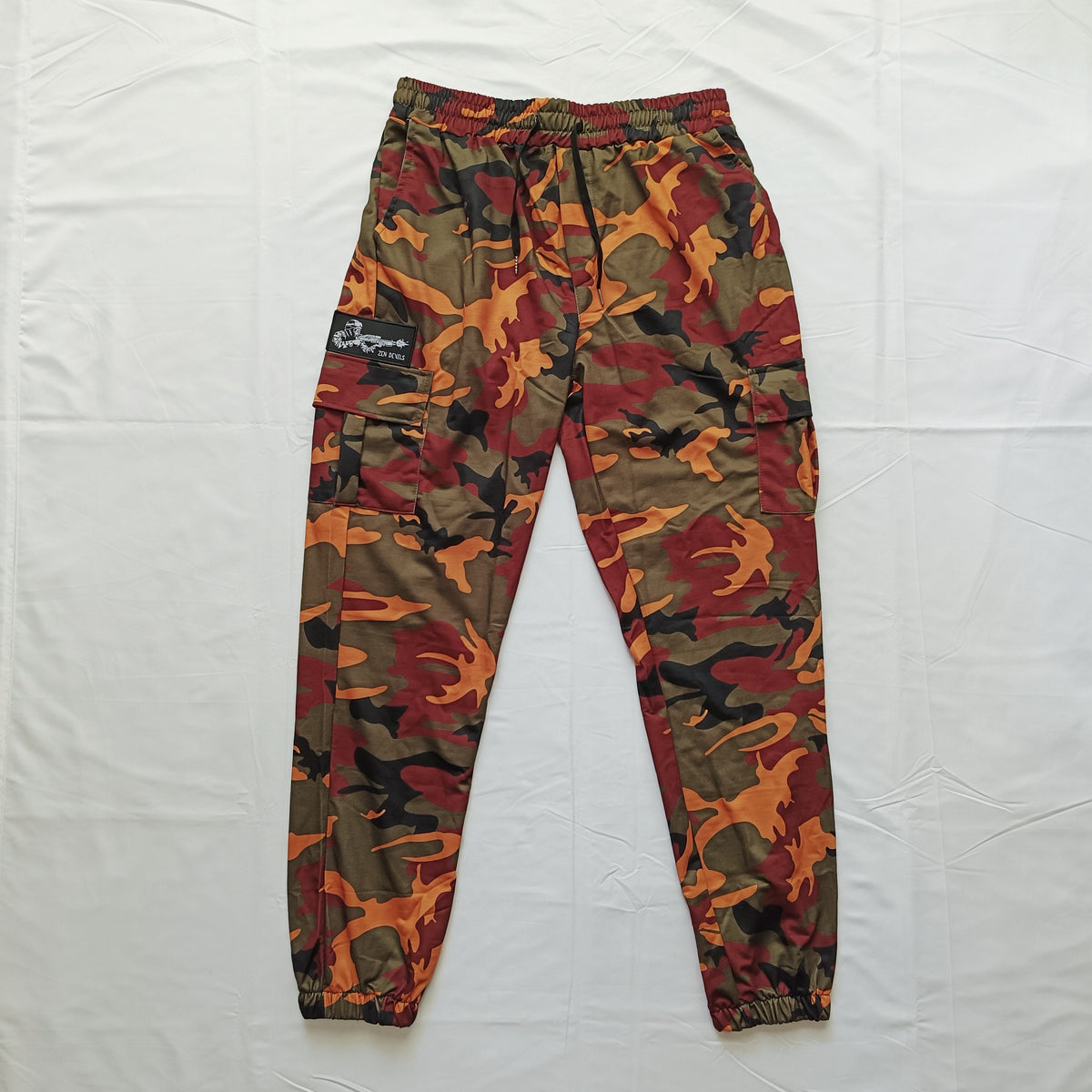 The Hazardous Environment Pants [orange camo]